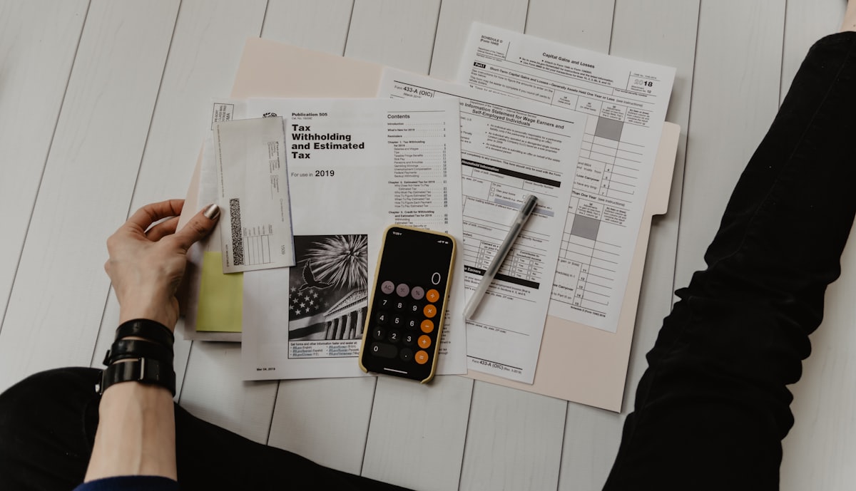 A landlord sorting through rental paperwork